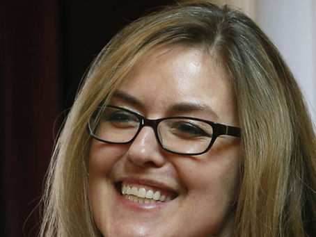 Wexton Mirrors McAuliffe in Debate with Cao